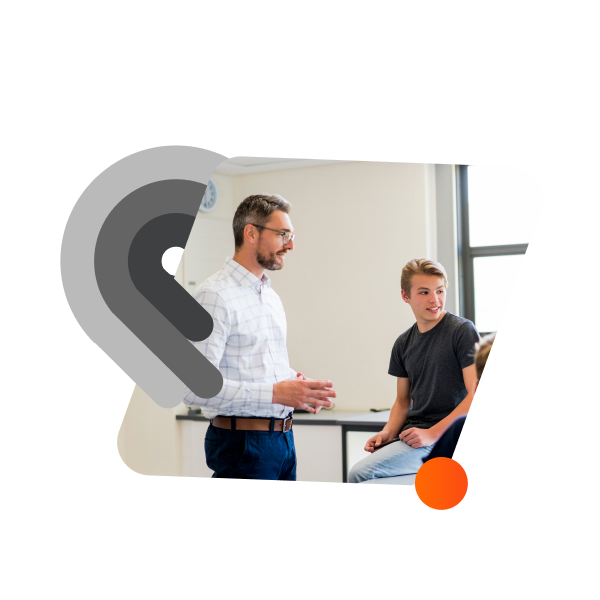 professore in aula con alunni business - WINDTRE